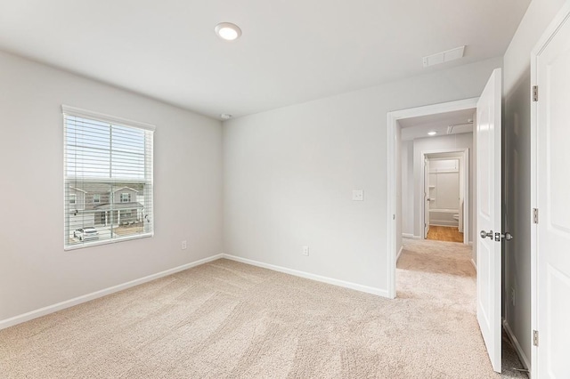 view of carpeted spare room