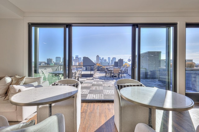 dining area with hardwood / wood-style flooring