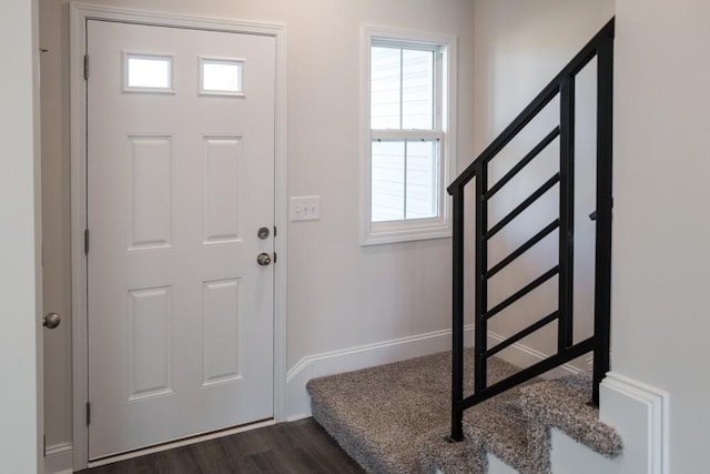 entryway featuring dark wood-type flooring