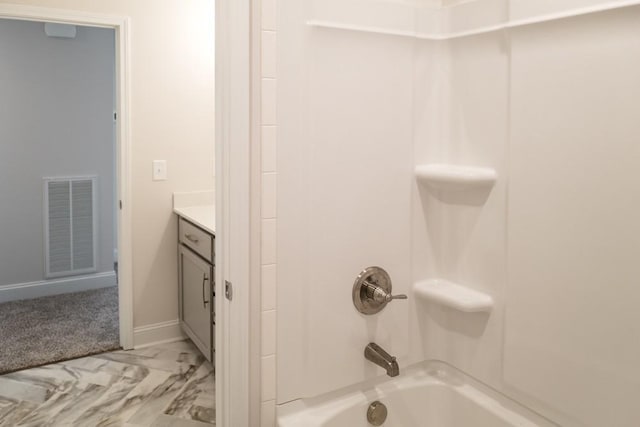 bathroom featuring vanity and shower / bathtub combination