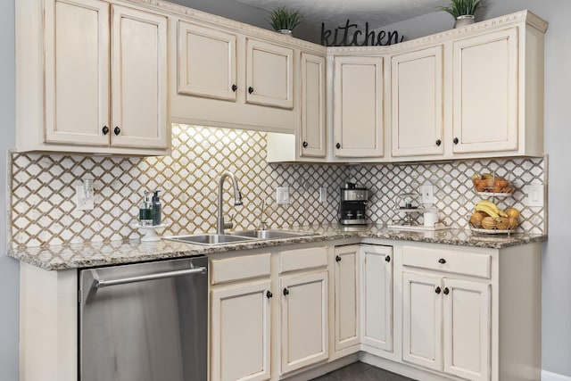 kitchen with dishwasher, sink, light stone countertops, and backsplash