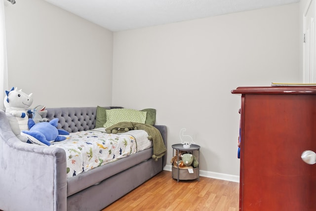 bedroom featuring light hardwood / wood-style floors