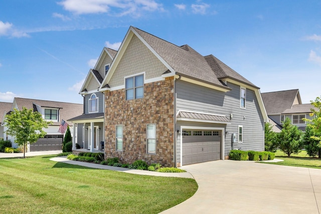 craftsman inspired home with a garage and a front yard