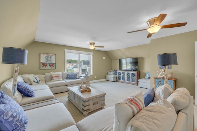 carpeted living room with lofted ceiling and ceiling fan