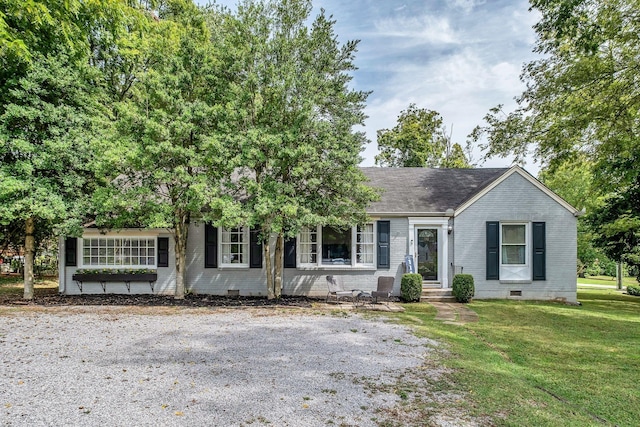 view of front of home with a front yard