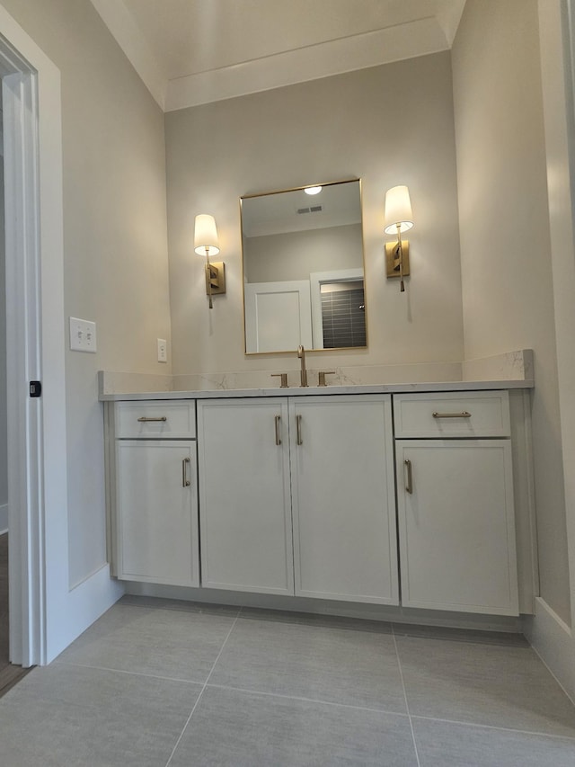 bathroom with vanity and tile patterned floors