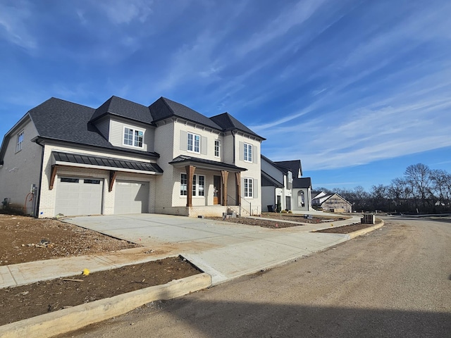 view of front of home featuring a garage