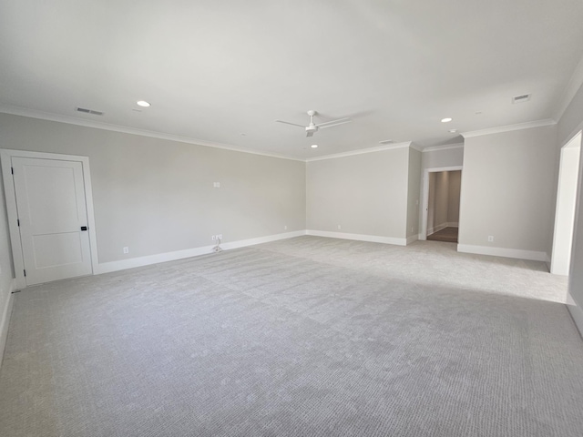 unfurnished room with ceiling fan, ornamental molding, and light colored carpet