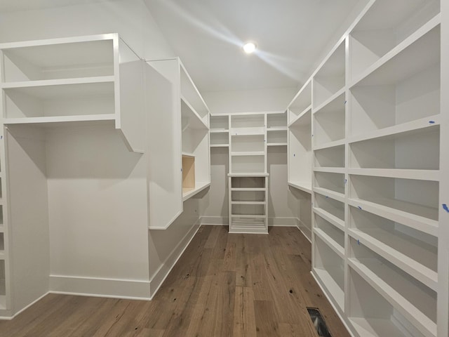 walk in closet featuring hardwood / wood-style floors