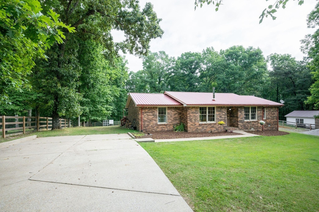 view of front of home with a front yard