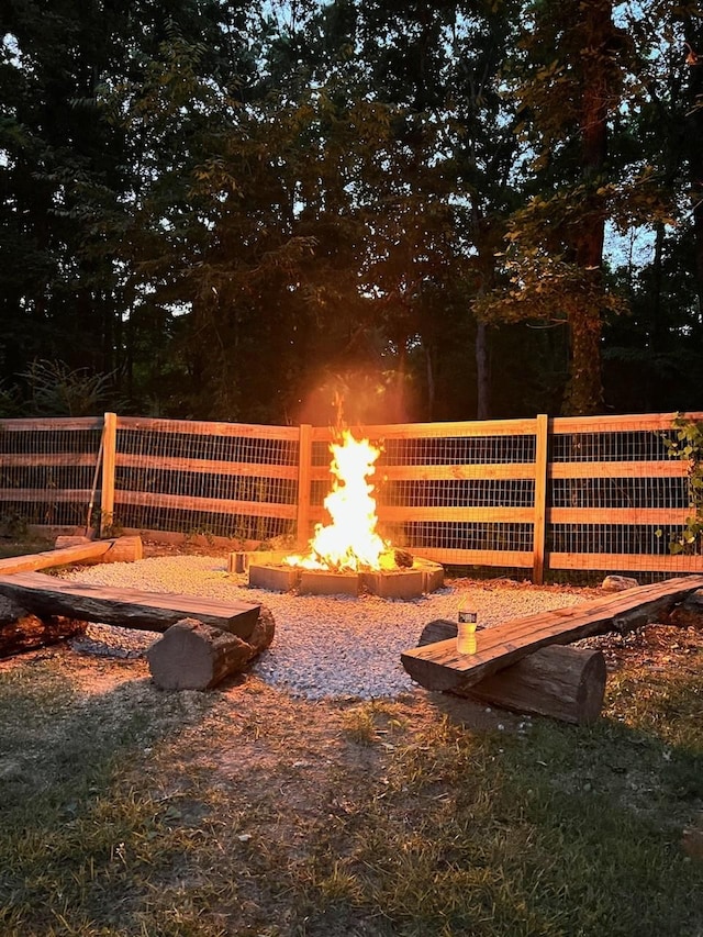 exterior space with an outdoor fire pit