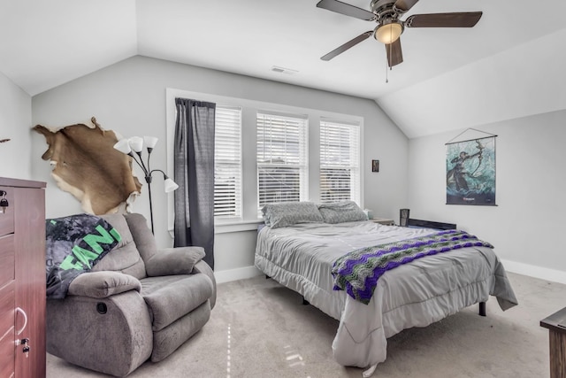 carpeted bedroom featuring vaulted ceiling and ceiling fan