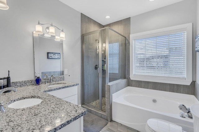 bathroom featuring vanity, tile patterned flooring, and independent shower and bath