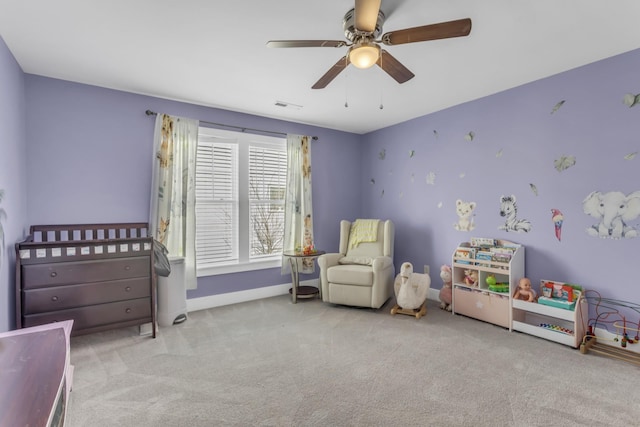 carpeted bedroom featuring ceiling fan