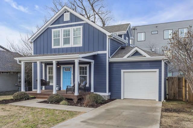 view of front facade with a garage and covered porch