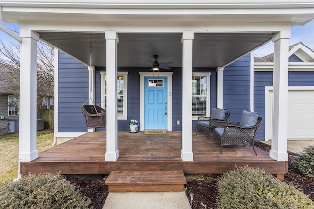 property entrance featuring ceiling fan and covered porch