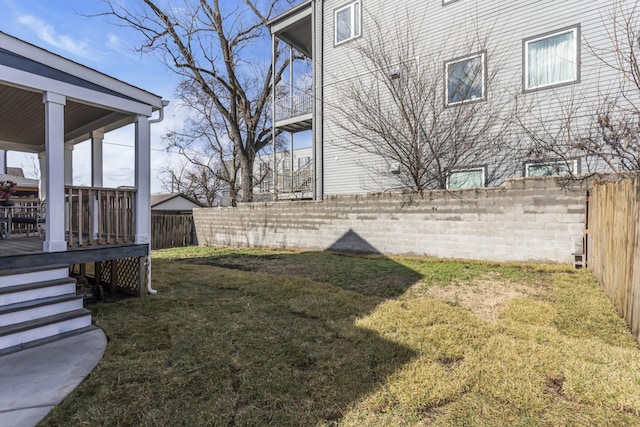 view of yard featuring a deck