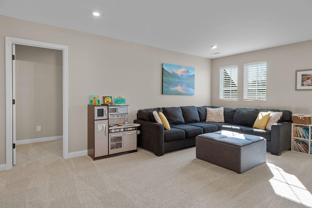 living room featuring light colored carpet