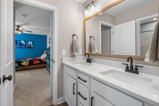 bathroom featuring vanity and ceiling fan