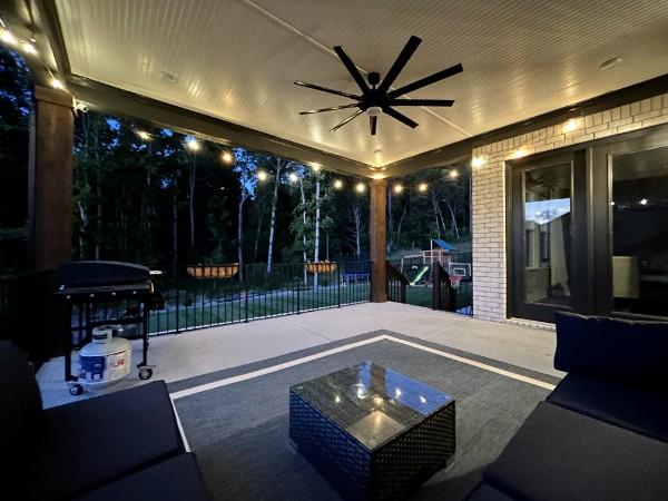 view of patio / terrace featuring ceiling fan