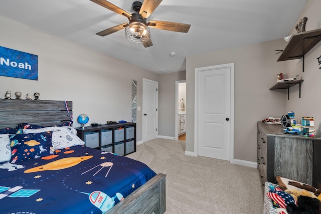 bedroom with light carpet and ceiling fan