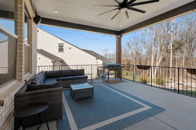 view of patio / terrace with area for grilling, outdoor lounge area, and ceiling fan