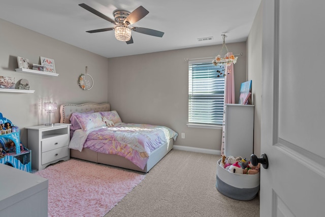 bedroom featuring ceiling fan and light colored carpet