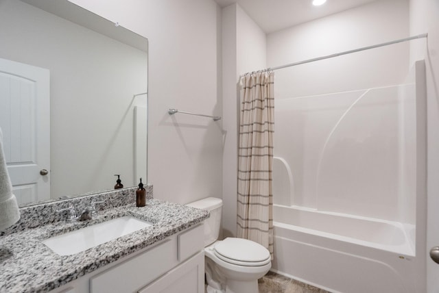 full bathroom with vanity, toilet, and shower / bath combo with shower curtain