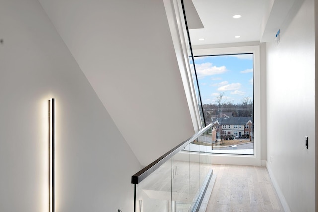 stairway featuring hardwood / wood-style floors