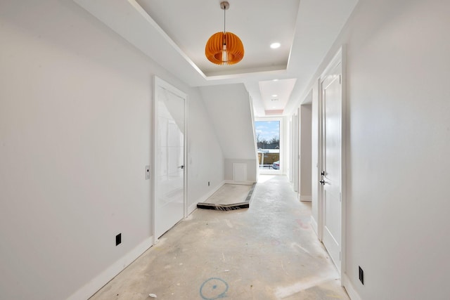 corridor with a tray ceiling