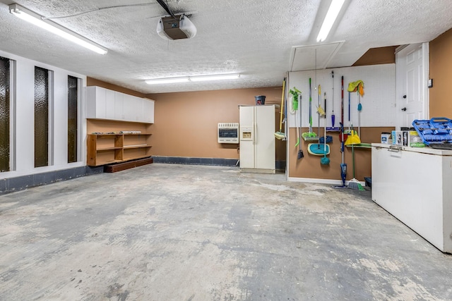 garage featuring a garage door opener, white refrigerator with ice dispenser, and heating unit