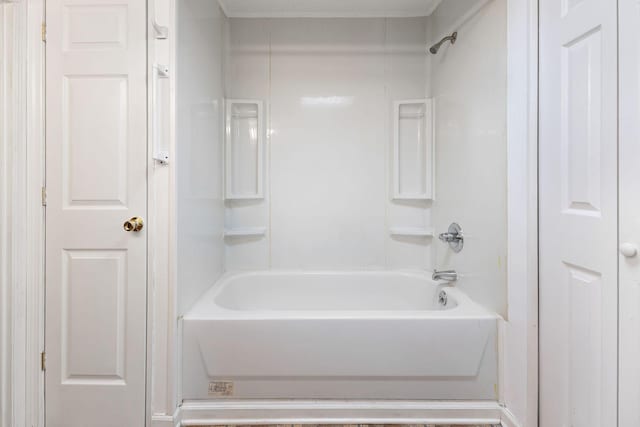 bathroom featuring  shower combination