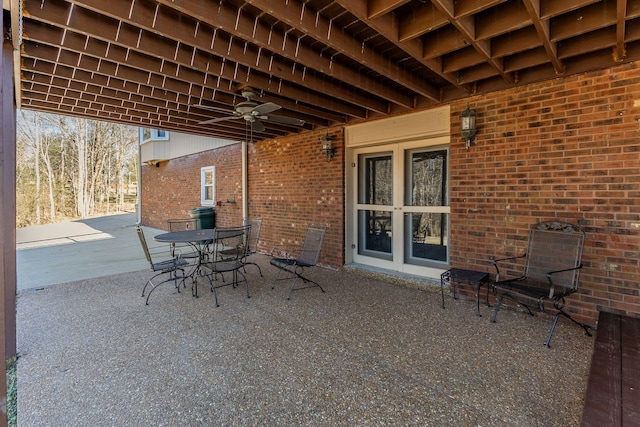 view of patio featuring ceiling fan