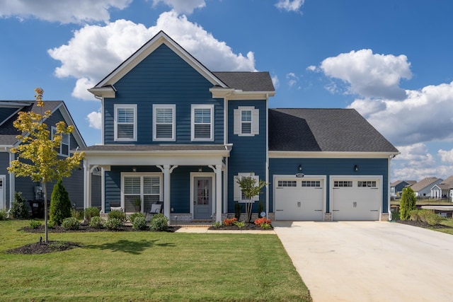 view of front of house with a porch, a garage, and a front yard