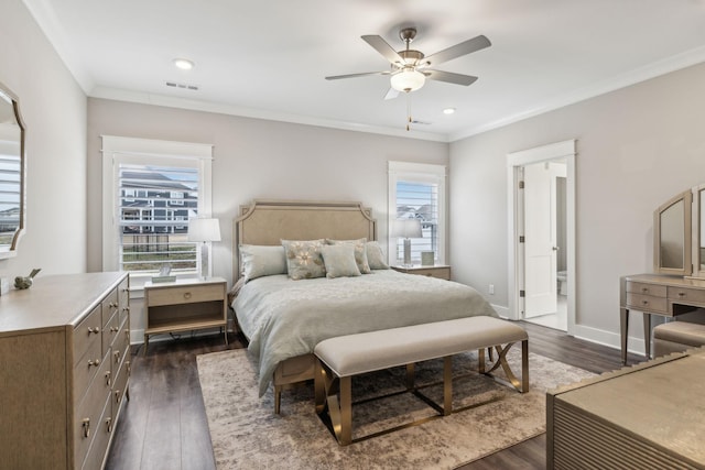 bedroom with dark wood-type flooring, ornamental molding, and ceiling fan