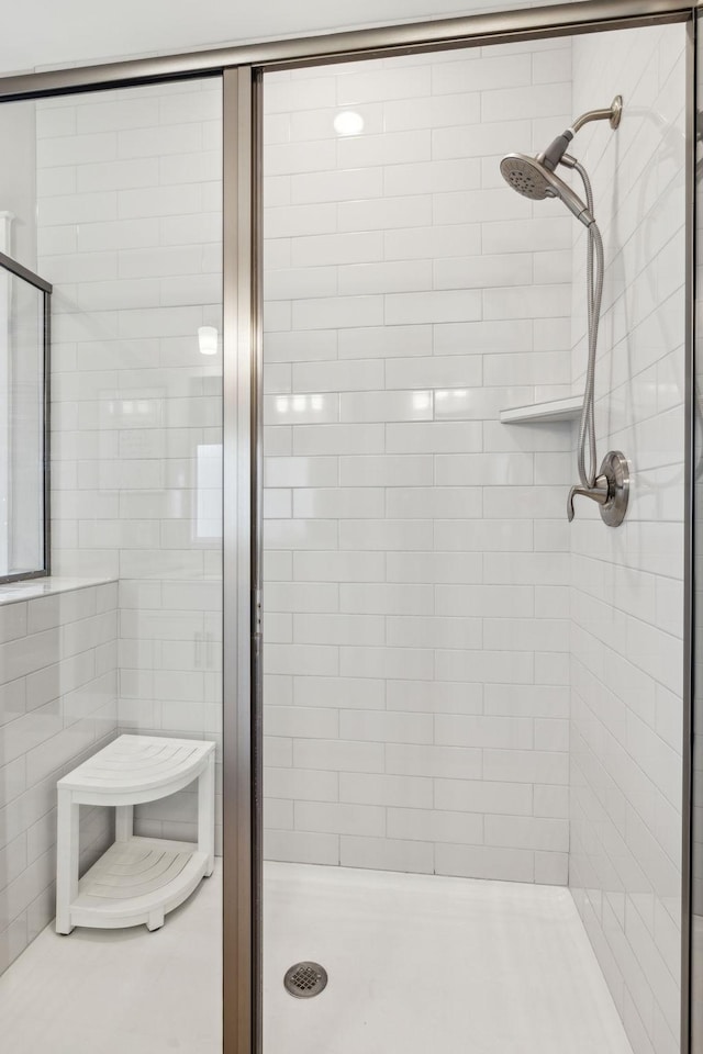 bathroom featuring walk in shower