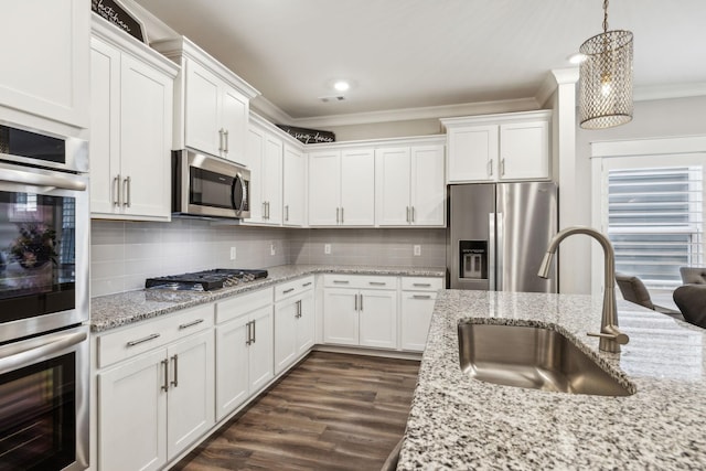 kitchen featuring white cabinetry, sink, and stainless steel appliances