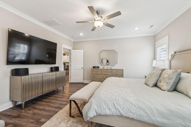 bedroom with ornamental molding, dark hardwood / wood-style floors, and ceiling fan