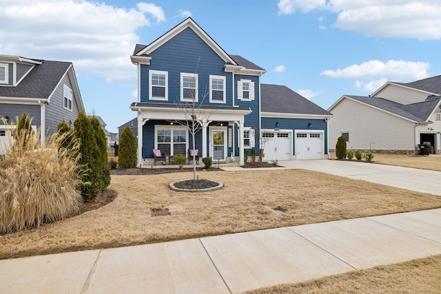 view of front facade featuring a garage and covered porch