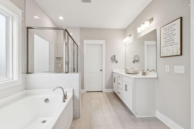 bathroom with vanity, separate shower and tub, and tile patterned floors