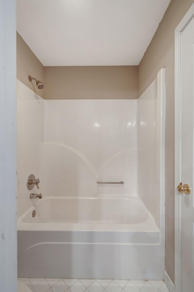 bathroom with  shower combination and tile patterned flooring