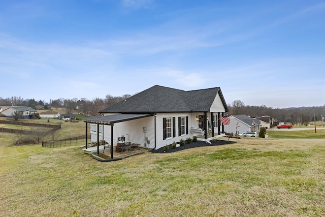 view of home's exterior featuring a yard