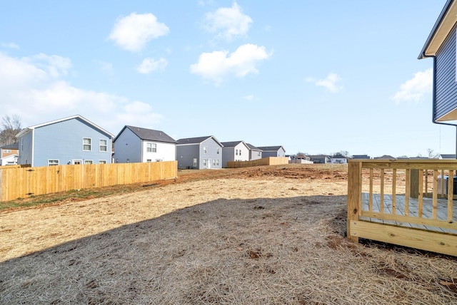 view of yard with a wooden deck