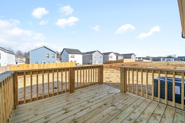 wooden deck with central air condition unit