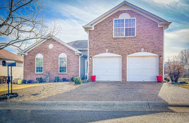 front of property with a garage