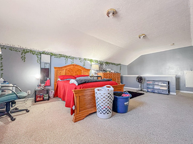 carpeted bedroom featuring vaulted ceiling and a textured ceiling