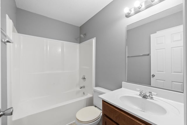 full bathroom with vanity, shower / tub combination, and toilet