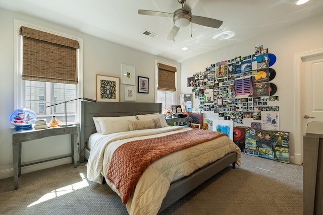 carpeted bedroom with ceiling fan