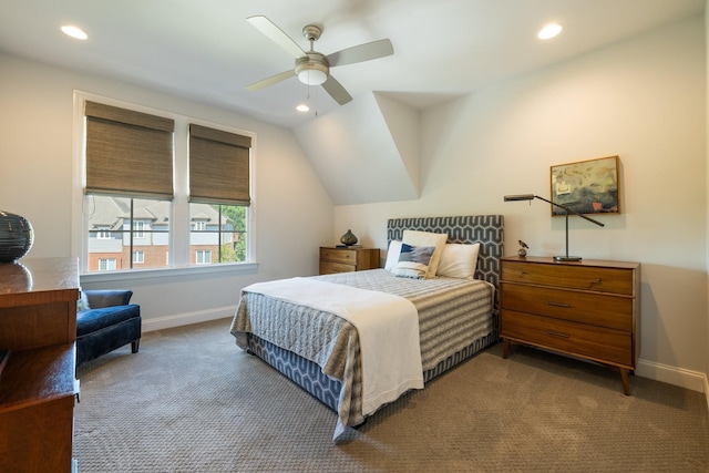 bedroom featuring ceiling fan, lofted ceiling, and carpet