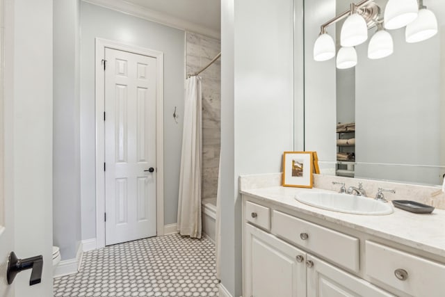 full bathroom featuring ornamental molding, vanity, toilet, and shower / bath combo with shower curtain